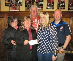 Congratulations to Tom O'Shea, joint winner of Athea Utd, Last Man Standing, kindly sponsored by Tom O'Grady of Brown Joe's Bar. Ciara O'Grady pictured presenting Michelle O'Shea with the winning cheque also included are Clare Ryan, Pa Walsh and Tim O'Riordan, officers of the club 