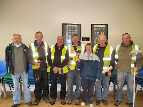 Some of the FÁS workers who were involved in the painting of the community hall recently with Supervisor, Jim Carmody, Pa Kiely, John O’Mahony, Donnacha Quille, Jim Sheehy, Philip Kelly and Margaret Dalton, missing from photo are Noel O’Sullivan, Jim O’Sullivan, Seamus Ahern, Martin Lyons and  Michael O’Connor