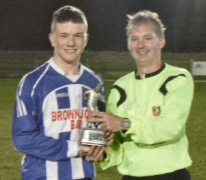 Shane Mulvihill receives the man of the match award from referee Pat King 