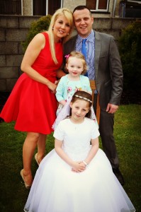 Lauren Murphy with her family on her Communion day  