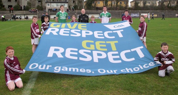 Athea Coiste na nÓg players holding the ‘Give Respect Get Respect’ flag before Limerick’s League match against Fermanagh on Sunday last 