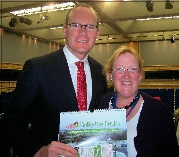 Kathleen  Barrett,  presenting Minister for Agriculture Mr. Simon Coveney with  the Valley View Equine Retirement calendar 2014 at the Animal Welfare Conference held on Friday, May 16th in Dublin Castle. 