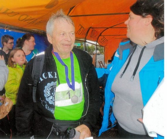 Joe Aherne, Glenagower being congratulated after successfully completing the JFK 50k challenge in Sneem recently. Well done Joe 