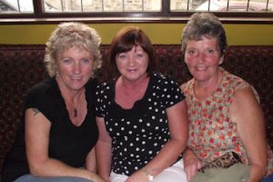 Mary T. Mulvihill, Mary Quinn and Patsy Hayes helping out at the Going Strong Summer Party in the Top of the Town recently 