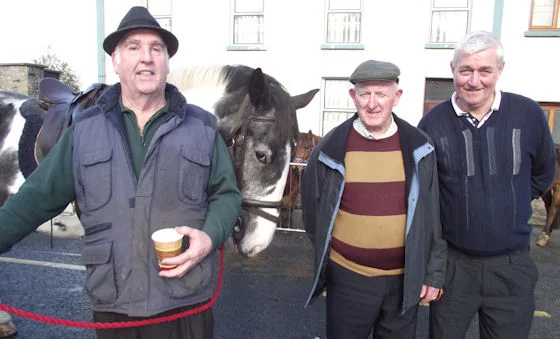 Jim ‘The Jobber’ O’Connor, Mick McCoy and Ned Ahern trying to strike a bargain at the Fair Day recently 