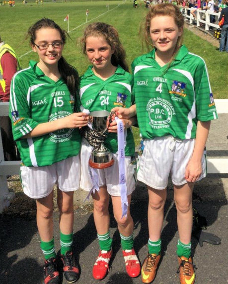 Claire Carmody, Michelle & Noelle Curtin with the U14 Cup 