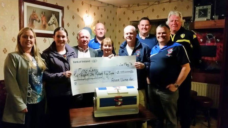 Mary Leahy, Moyvane who won last week’s Athea Utd lottery draw jackpot of €5,100 being presented with her cheque last Monday night at Donie’s Bar. Included in the photo family members and Athea Utd club officials Tim O'Riordan, Denis Murphy, Pa Walsh & Pat Hayes. 