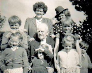This photo was taken in 1959 and was sent to me recently by a cousin in Canada.  Nell Faley, her sister Mary Curtin, her father Paddy White. with children Peg, Helen and Bridie Faley in front and Chrissie, Josephine and Raymond Curtin in middle row 